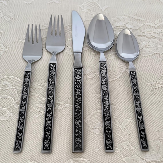 70-pc. Stainless MCM Flatware Set by Eldan/roses on Black Handle