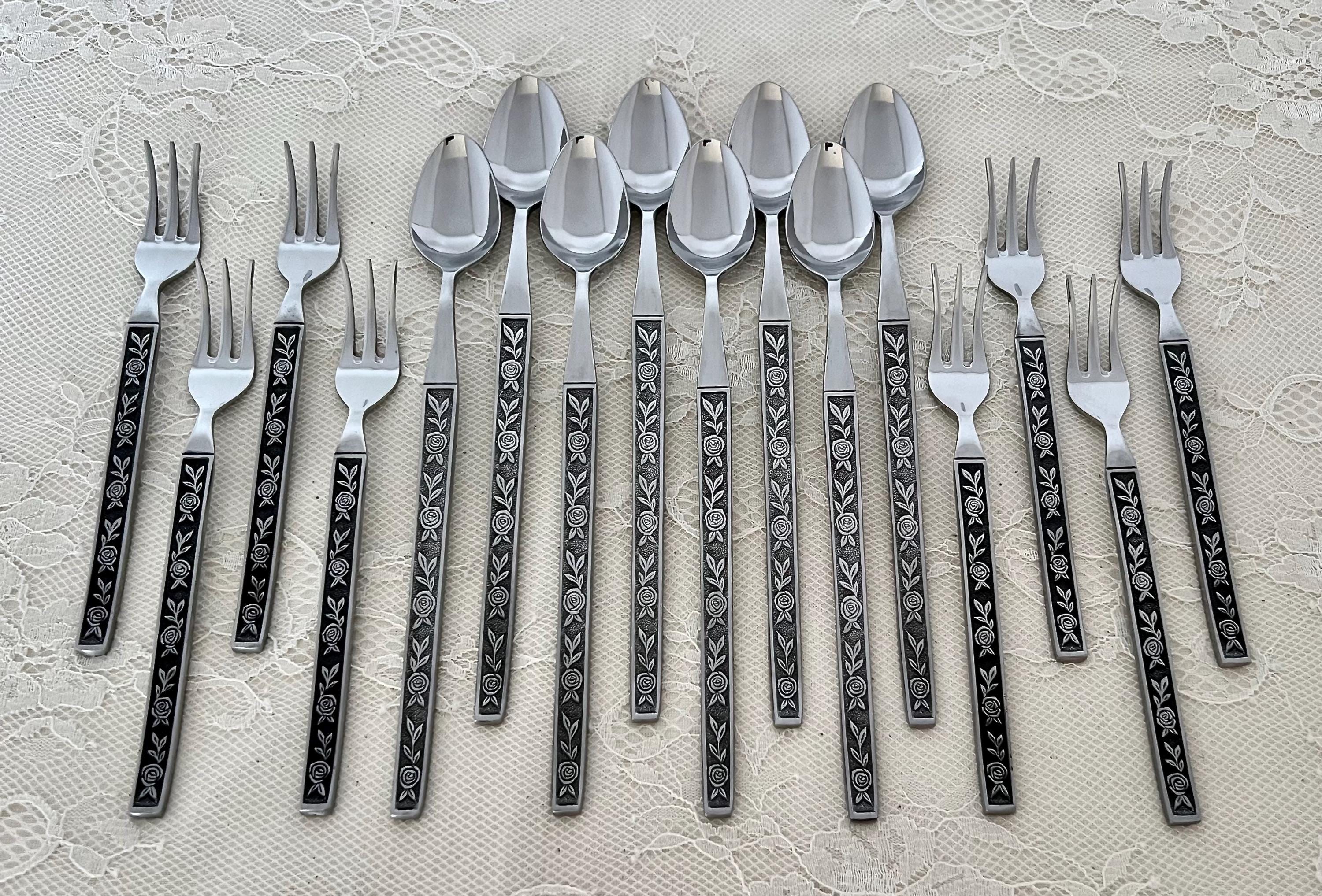 70-pc. Stainless MCM Flatware Set by Eldan/roses on Black Handle