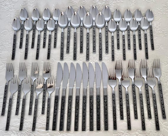 70-pc. Stainless MCM Flatware Set by Eldan/roses on Black Handle