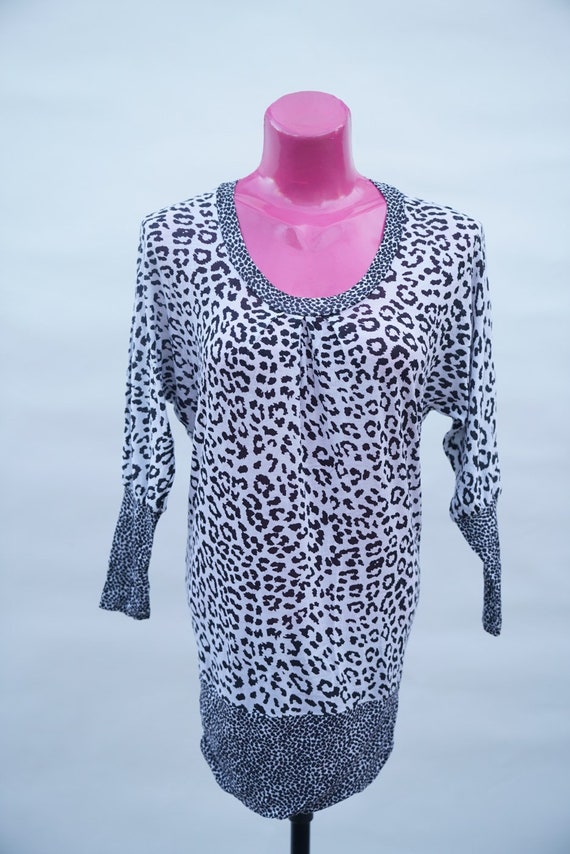 Tee: vintage animal print black tee