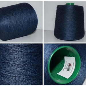 May include: A spool of dark blue linen thread with a green label that reads "Lino Delave" and "100% LIN 144 2200000".