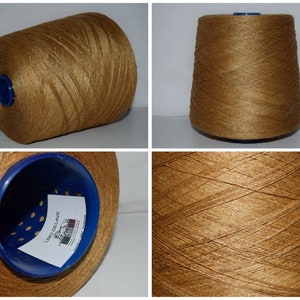 May include: A spool of brown linen yarn, labeled "Lino Delave", with a blue plastic bobbin.