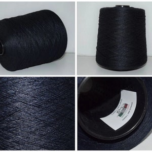 May include: A spool of dark blue thread with a white label that reads "LIFICI DEL SAVE" and "MADE IN ITALY" in black text.