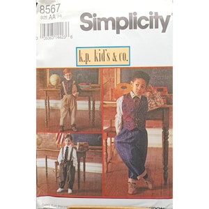 May include: Simplicity sewing pattern featuring children's clothing designs. The pattern includes images of boys in various outfits, including vests, suspenders, and dress pants. The text on the pattern reads "k.p. kid's & co."