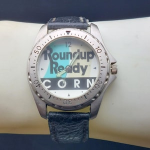 Orologio promozionale vintage Sweda Roundup Ready Corn, cassa in acciaio inossidabile al quarzo, cinturino in pelle nera