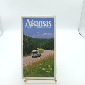 Carte vintage 1990 de l'Arkansas State Highway avec illustration panoramique
