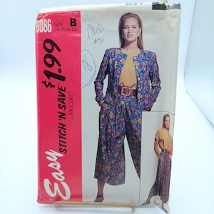 May include: A vintage sewing pattern by McCall's, featuring a woman in a floral print jacket and pants. The pattern is size B (16-18-20-22) and includes the text "Easy Stitch 'N Save". The cover is red and white.