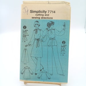 May include: Simplicity sewing pattern number 7714 for trousers, a dress or tunic, and a tunic. The pattern includes 11 pieces and instructions for cutting and sewing.