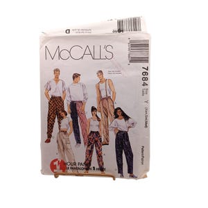 May include: A McCall's 7684 sewing pattern envelope for 1 Hour Pants in size Y. The front features illustrations of various pants styles including patterned, striped, and solid designs worn by models, with text including the brand name and pattern number.