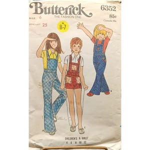 May include: A vintage sewing pattern for children's overalls. The pattern is for sizes 4-12 and includes three different styles of overalls. The pattern is from Butterick and is number 6352.