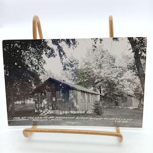 Postal antigua de RPPC con fotografía real de cabañas en Hiawatha Beach Resort en Leech Lake Walker, Minnesota