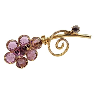Vintage Gold Tone Floral Brooch with Purple Bezel Set Crystals