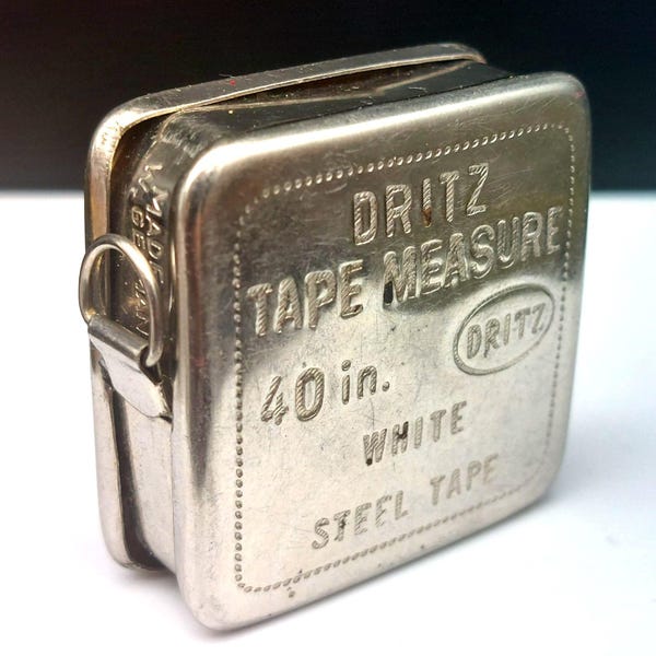 Cinta métrica miniatura de acero Dritz vintage, retráctil, de 40 pulgadas, fabricada en Alemania Occidental para costura.