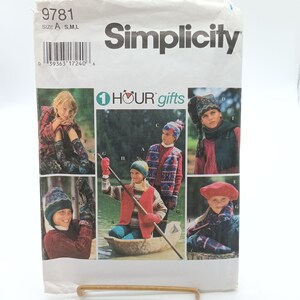 May include: Simplicity sewing pattern number 9781 for making children's hats and scarves. The pattern includes instructions for making a variety of styles, including a beanie, a slouchy hat, and a scarf. The pattern is for sizes S, M, and L.