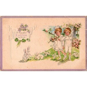 Cartolina di Pasqua vintage con bambini e coniglietti della National Art Co. Stampata in America