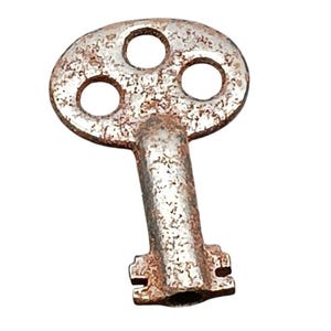 May include: A vintage, rusty metal key with an oval head featuring three circular holes. The key's stem is rectangular, and the bit has two rectangular notches. The key has a weathered, aged appearance.