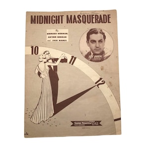 May include: Vintage sheet music cover titled "Midnight Masquerade" featuring a couple dancing, a portrait of Bide Barron, and a clock design. The cover is tan with brown text and illustrations. Published by Shapiro, Bernstein & Co.
