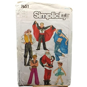 May include: A vintage Simplicity sewing pattern for making six different costumes. The pattern includes a pirate, a vampire, a belly dancer, a genie, Santa Claus, and a ballerina. The pattern number is 7651.