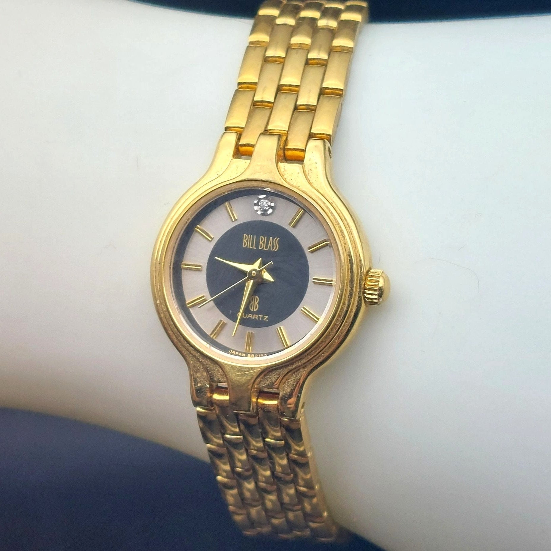 Bill Blass Womens 293 3132 Gold tone Quartz Watch With Black Dial Diamond Accent Etsy