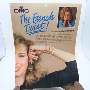 May include: A close-up of a colorful bracelet made with the French Twist technique. The bracelet is made with DMC Embroidery Floss and is shown on a woman's wrist. The image also includes the text "The French Twist! A Totally New Concept".