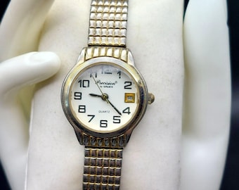 Vintage Gruen Precision Quartz damesdatumhorloge met stretchband roestvrijstalen achterkant Japan Movt gouden en zilveren accenten
