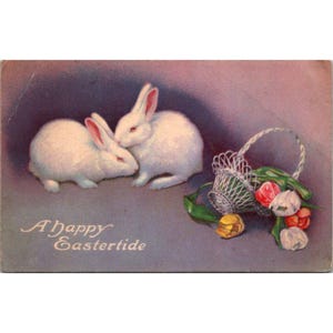 Cartolina di Pasqua vintage del 1923 con coniglietti bianchi e cestino