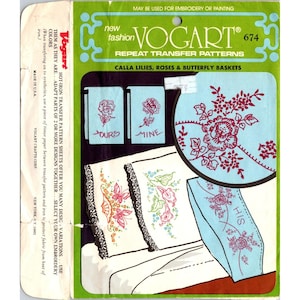 May include: Vogart 674 repeat transfer patterns for embroidery, featuring calla lilies, roses, and butterfly baskets. The package includes designs for pillowcases and towels, with the words "Yours", "Mine", and "His".
