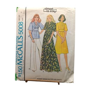 May include: Vintage McCall's 5008 sewing pattern. The pattern features three different designs: a top with pants, a floral print dress, and a yellow dress. The pattern is for Misses' sizes, with a bust size of 31 1/2 inches.