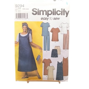 May include: Simplicity sewing pattern 9294 size FF 18W-24W for a dress, top, pants, and shorts. The envelope features a model wearing a sleeveless blue dress and white t-shirt, with illustrations of various garment combinations in solid and patterned fabrics.