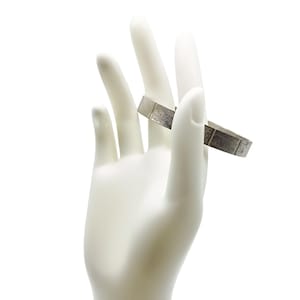 Vintage Brushed Silver-Tone Metal Bangle Bracelet with Geometric Line Detailing