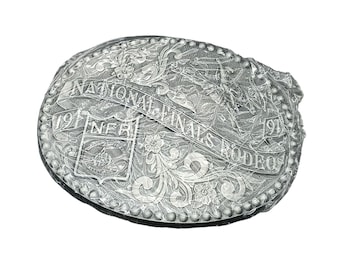 Hebilla de cinturón plateada de rodeo de las finales nacionales de Hesston de 1991, coleccionable del oeste
