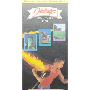 May include: A 1990 Minnesota Highway Map with the word "Celebrate" in a banner. The map features images of buildings and a person holding a torch with flames.