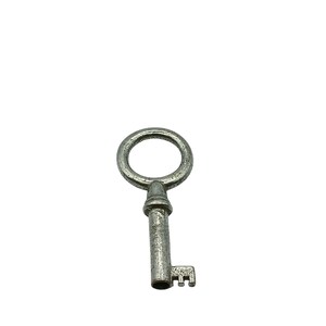 May include: A vintage-style key with a circular handle and a textured, aged appearance. The key's shaft is cylindrical, leading to a rectangular bit with three teeth. The metal has a silver-gray color, suggesting it's made of steel or a similar alloy.