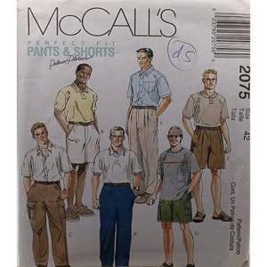 May include: McCall's sewing pattern 2075 for pants and shorts in size 42. The envelope features illustrations of six figures wearing various styles of shirts, trousers, and shorts, including cargo-style pockets, pleated fronts, and button-down shirts.