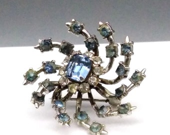 Vintage Coro Pinwheel Flower Brooch with Emerald Cut Center Rhinestone, Spiral Comet in Ice Blue Crystals