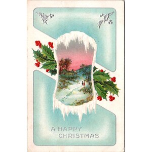 Postal navideña vintage de 1912 con escena nevada y acebo