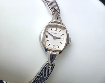 Vintage caravelle mechanisch dameshorloge roestvrijstalen stretchband jaren 50