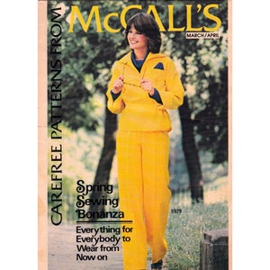 May include: A vintage McCall's magazine cover featuring a woman wearing a yellow pantsuit and holding a pair of glasses. The cover text reads "Carefree Patterns From McCall's" and "Spring Sewing Bonanza".
