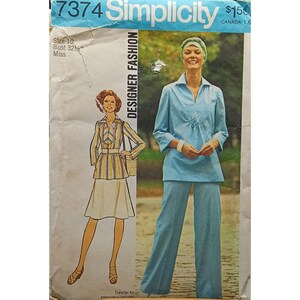 May include: Vintage Simplicity Designer Fashion sewing pattern, size 10, bust 32 inches. The pattern features illustrations of a two-piece outfit and a skirt suit. The cover is light blue with the text "Simplicity" and "Designer Fashion".