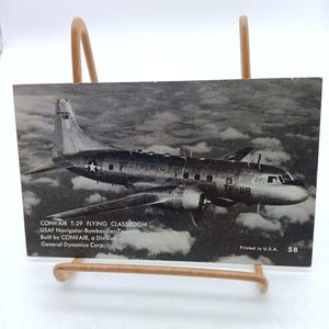 Carte postale vintage Convair T-29 Flying Classroom avec carte Mutoscope d'arcade d'aviation d'aviation d'impression d'avions d'entraînement de navigateur-bombardier de l'USAF