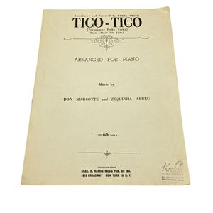 Peut inclure: Une partition vintage de couleur blanc cassé pour Tico-Tico, arrangée pour piano. Le texte indique Introduced and Featured by Ethel Smith, Tico-Tico, Pronounced Teeko-Teeko, Tico-Tico No Fuba, Music by Don Marcotte and Zequinha Abreu, Price 60 cents.