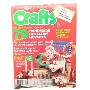 May include: A December 1986 issue of Crafts magazine with a red cover featuring the title Crafts in large green letters. The cover displays text about 79 handmade holiday projects, including a Santa figure, furry animals, and a tablecloth.