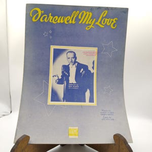 May include: Sheet music cover titled "Farewell My Love" with a blue and yellow color scheme. The cover features a portrait of a man in a suit holding a microphone, with the text "Featured by Ray Block". The Harms logo is at the bottom.