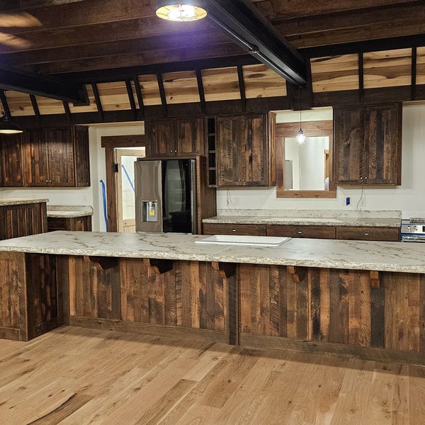 Barnwood Kitchen Cabinets and Concrete Countertops.