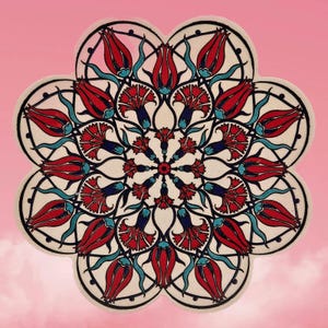 May include: A white circular mandala with a red, blue, and green floral design. The mandala is made up of repeating patterns of flowers and leaves.