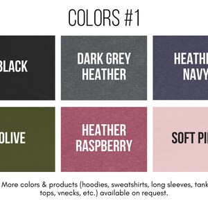 May include: A color chart showing different t-shirt colors, including black, dark grey heather, heather navy, olive, heather raspberry, and soft pink.  The text "COLORS #1" is at the top of the chart.