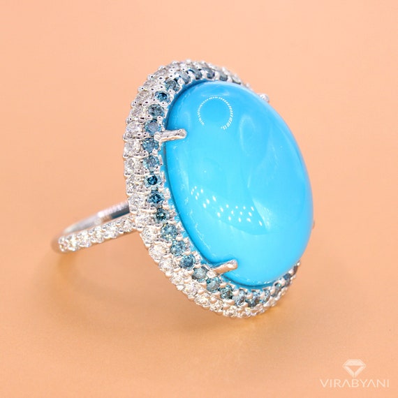 10.25 Ct. Natural Turquoise Oval Halo Ring in 18K White Gold 10.25 Ct. Natural Turquoise Oval Halo Ring in 18K White Gold