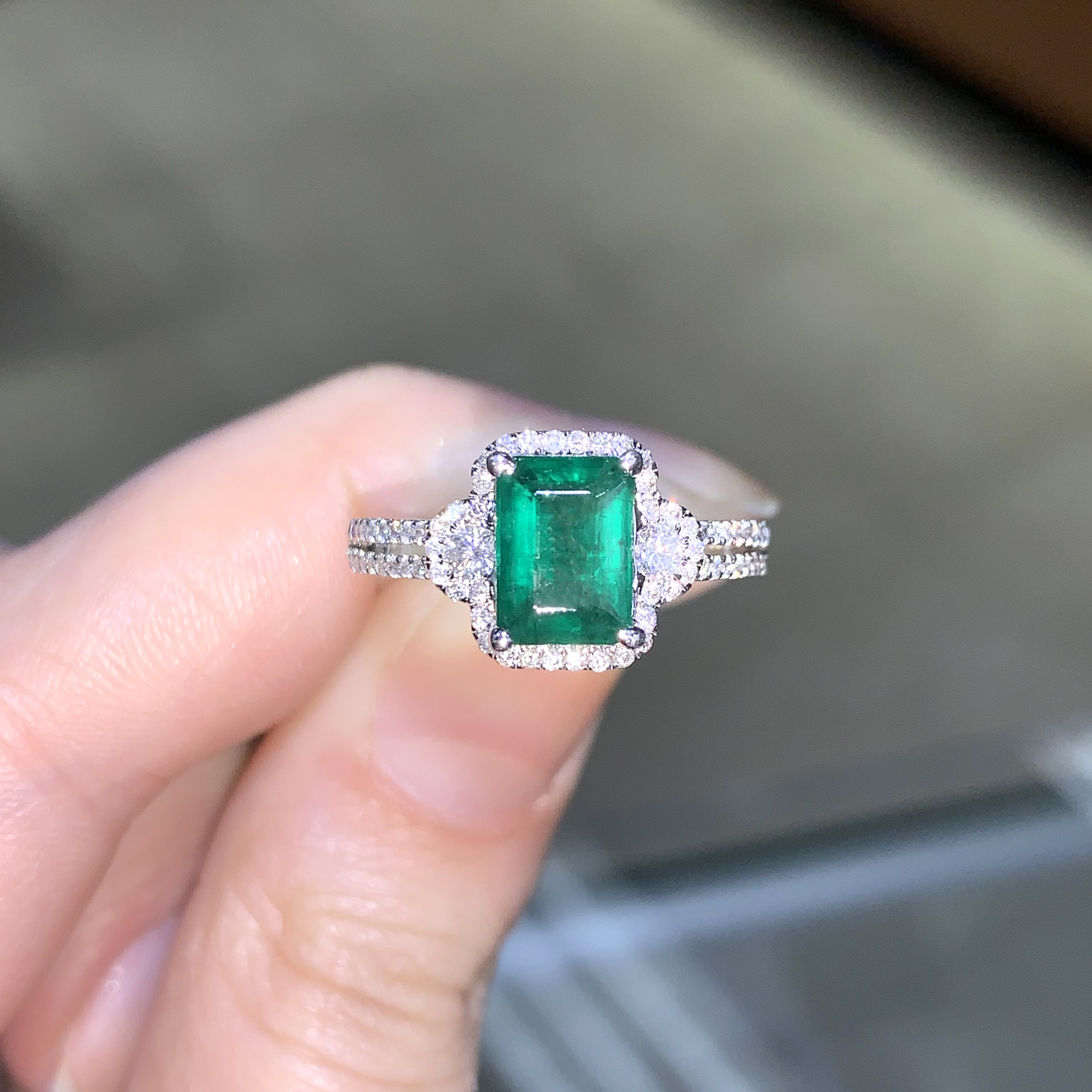 1.42ct. Genuine Emerald and 0.45 Ctw. Diamond Three-stone Halo