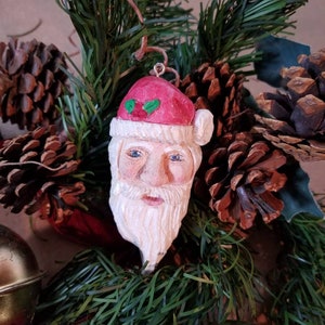 Hand Carved Wooden Santa ornament