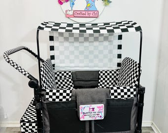 May include: A black and gray wagon with a checkered canopy and seat covers. The wagon has a handle and four wheels. A decorative sign with a sewing machine and the text "Crafted by Chi" hangs above the wagon.